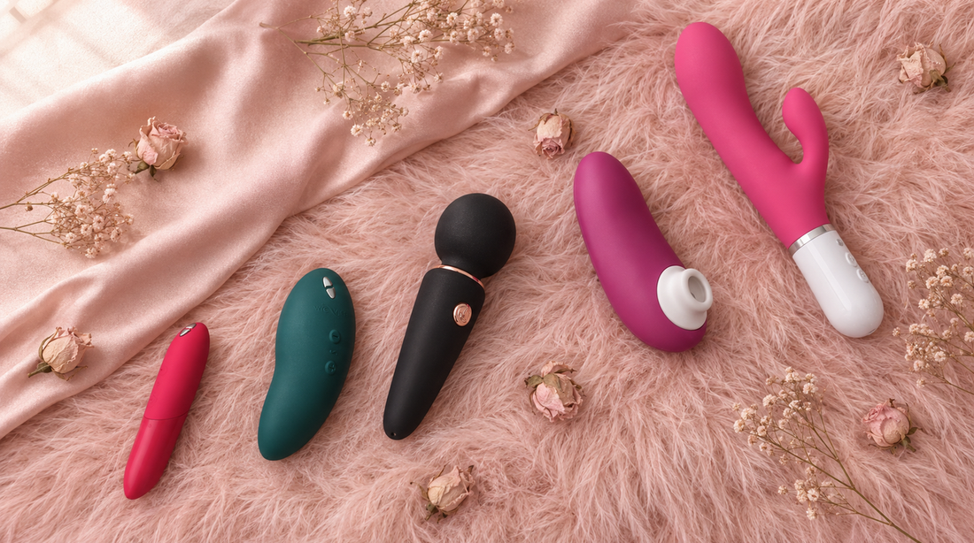 Five beginner vibrator shapes on blush pink feathers and silk