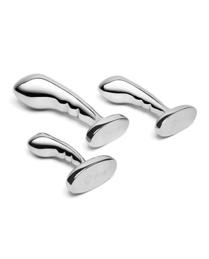 Set of silver anal plugs on a white background