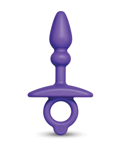 Purple butt plug on a white background