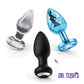 Dr. Tush's Venture Collection Small anal plug set showing glass, silicone, and metal plugs arranged together, no packaging shown