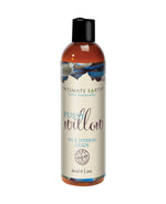 Bottle of Pussy Willow Silk Hybrid Glide and personal lubricant with Intimate Earth branding on a white background