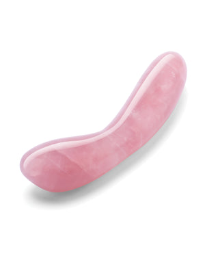 Pink g-spot sex toy on a white background