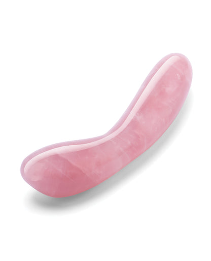 Pink g-spot sex toy on a white background