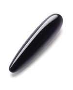 Black and white oval g-spot toy on a white background