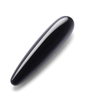 Black and white oval g-spot toy on a white background