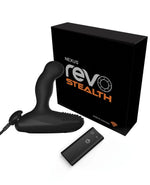 Black remote control device with Nexus Revo Stealth Remote Control Rotating Prostate Massager and packaging on a white background