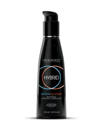 Black bottle of Wicked Hybrid lubricant on a white background