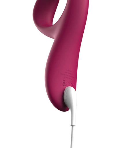We-Vibe Nova 2 Flexible Rabbit Vibrator in Fuchsia, close-up of the USB charging cable connected to the base