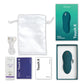 We-Vibe Touch X in Green Velvet full kit flat-lay: device, retail box, USB cable, satin storage pouch, lube sample, and instruction cards