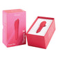 We-Vibe Tango X Bullet Vibrator in Cherry Red nested in its open retail box beside the closed packaging