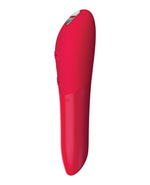 We-Vibe Tango X Bullet Vibrator in Cherry Red, angled view showing the tapered tip and control buttons