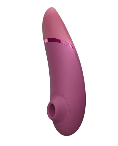 Womanizer Next Clitoral & G-spot Vibrator in Plum, side view showing the air-pulse stimulator head opening