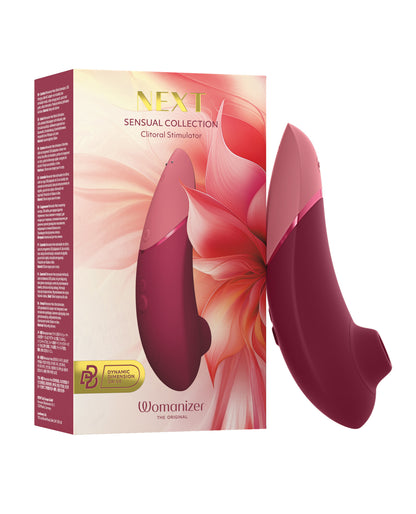 Womanizer clitoral stimulator with packaging on a white background